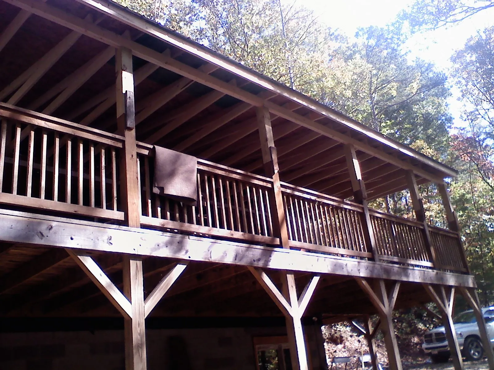 Timber framing under a new elevated porch and deck — Roof Leak Repair in Pennsboro by Roofing Brothers